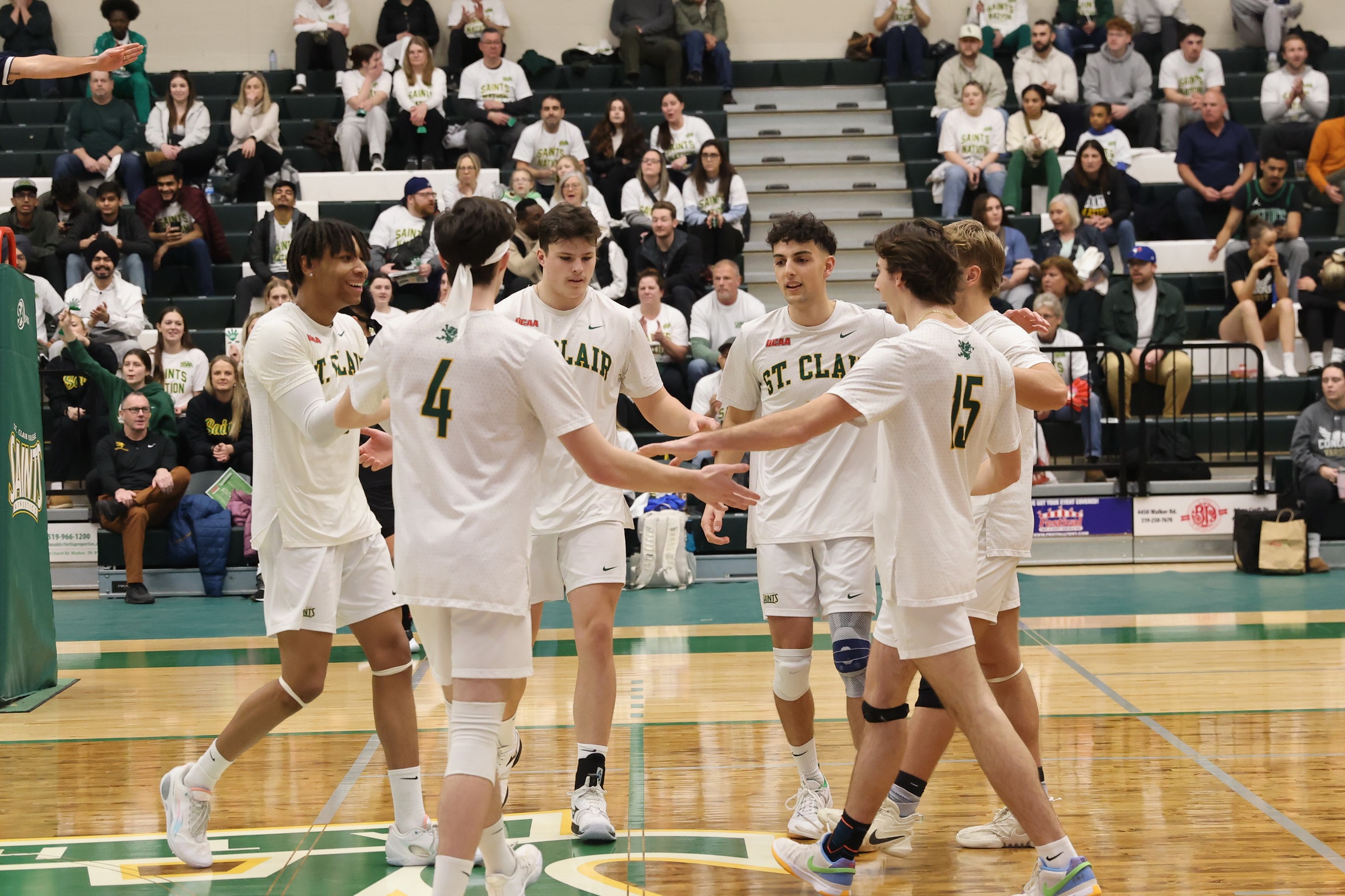 Men's Volleyball Split on the Road